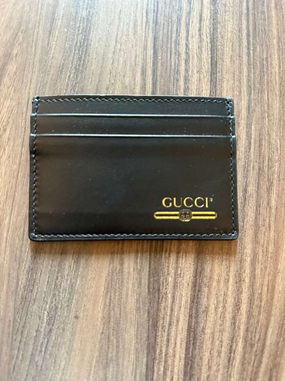 Gucci Black Leather Card Holder with Gold Logo Accent